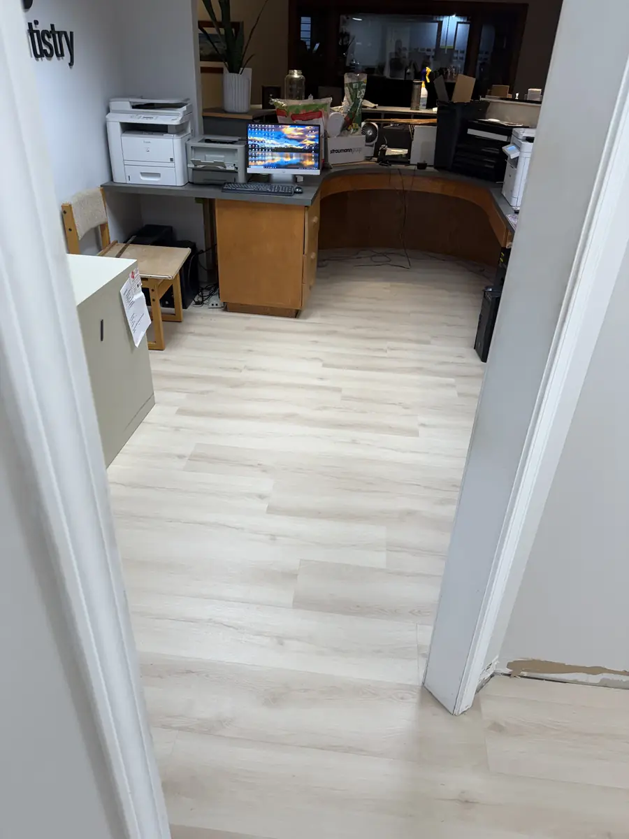 Light oak commercial LVP flooring installed in a dental office reception area — The Foothills Flooring Company, Hickory NC